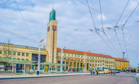 HRADEC KRALOVE, CZECH REPUBLIC, APRIL 29, 2015: people are strolling around the main train station in hradec kralove which together with nearby situated bus station creates transportation hub.のeditorial素材