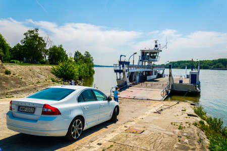 VAC, HUNGARY MAY 21, 2016: A car is waiting for boarding on a ferry in Vac, Hungaryのeditorial素材