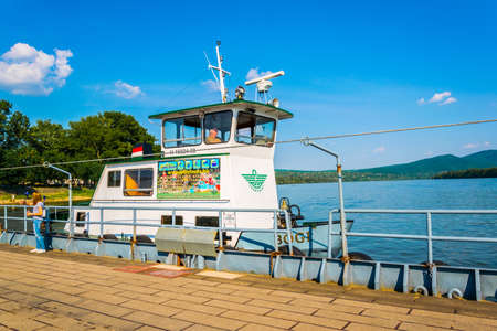 VAC, HUNGARY MAY 21, 2016: A ferry bringing people on the opposite side of the danube river in the...