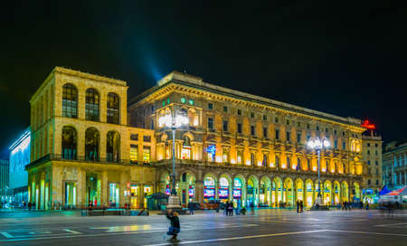 MILANO, ITALY, MARCH 13, 2016: night view of the illuminated Piazza del Duomo in Milan, Italyのeditorial素材