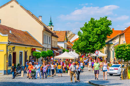 SZENTENDRE, HUNGARY MAY 22, 2016: People are walking on a buzzling street in the hungarian town szentendreのeditorial素材