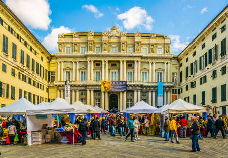 GENOA, ITALY, MARCH 13, 2016: people are enjoying sunny day on the square raffaele de ferrari in front of the palazzo ducale Genoa, Italyのeditorial素材