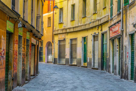 GENOA, ITALY, MARCH 13, 2016: View of a narrow street in the historical center of the italian city genoa.のeditorial素材