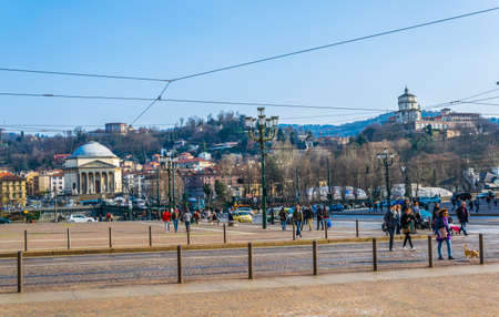 TORINO, ITALY, MARCH 12, 2016: people are strolling over the main square of the italian city torino - piazza vittorio veneto.のeditorial素材