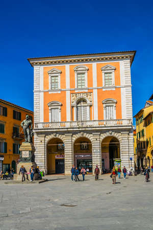 PISA, ITALY, MARCH 14, 2016: people are strolling through piazza garibaldi in pisa during sunny day in March.のeditorial素材