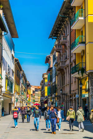 PISA, ITALY, MARCH 14, 2016: people are enjoying sunny day at spring strolling through boulevard...