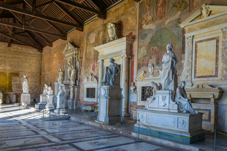 PISA, ITALY, MARCH 14, 2016: View of statues situated inside of the Camposanto Cemetery in the italian city Pisaのeditorial素材