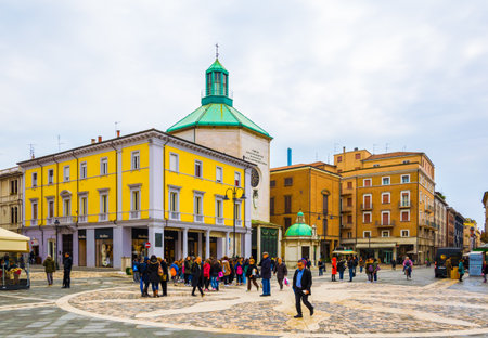 RIMINI, ITALY, MARCH 16, 2016: people are passing through piazza martiri in the italian city riminiのeditorial素材
