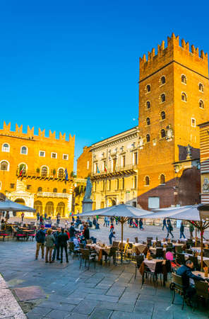 VERONA, ITALY, MARCH 19, 2016: people are strolling through piazza delle erbe in Verona, Italyのeditorial素材