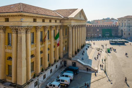 VERONA, ITALY, MARCH 19, 2016: People are strolling in front of the Palazzo Barbieri - the town hall of Verona, Italyのeditorial素材