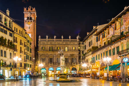 VERONA, ITALY, MARCH 19, 2016: people are strolling through piazza delle erbe in Verona, Italy during nightのeditorial素材