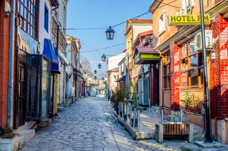 SKOPJE, MACEDONIA, FEBRUARY 16, 2015: People are walking through the old town of skopje which consist of many narrow streets full of shops, restaurants and even marketplaces.のeditorial素材