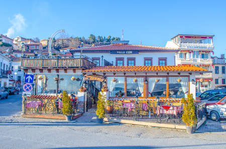 OHRID, MACEDONIA, FEBRUARY 15, 2015: lakeside restaurant in macedonian unesco listed city ohrid offers excellent view over whole ohrid lake providing border betwwen macedonia and albania.のeditorial素材