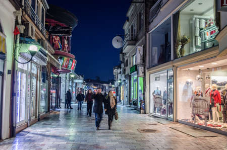 OHRID, MACEDONIA, FEBRUARY 14, 2015: night view over illuminated main shopping alley in the historical center of unesco listed macedonian town ohrid.のeditorial素材