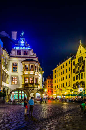 MUNICH, GERMANY, AUGUST 20, 2015: Night view of illuminated hofbrauhaus in german city munichのeditorial素材