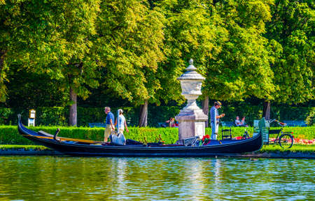MUNICH, GERMANY, AUGUST 20, 2015: gondola ride in the nymphenburg palace gardens is one of many pleasant activities available to visitorsのeditorial素材