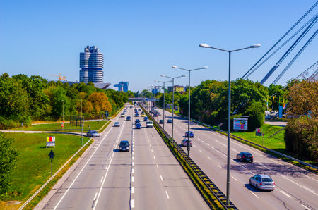 MUNICH, GERMANY, AUGUST 20, 2015: Cars driving fast on freeway next to the olympic park in Munich, Germanyのeditorial素材