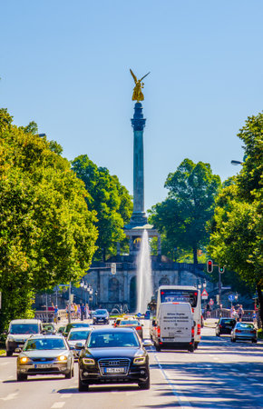 MUNICH, GERMANY, AUGUST 20, 2015: Busy avenue leading towards the golden angel of peace "Friedensengel" in Munich in Bavariaのeditorial素材