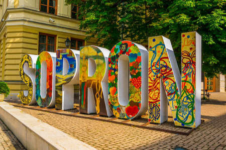 SOPRON, HUNGARY, JUNE 17, 2016: A decorative sign Sopron advertising local tourist agency in Sopron,...