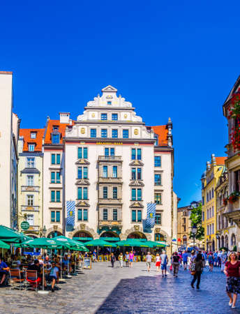 MUNICH, GERMANY, AUGUST 20, 2015: people are buying souvenirs on orlandostrasse in munich which hosts famous hofbrauhaus at ist endのeditorial素材