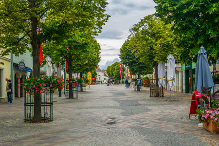 EISENSTADT, AUSTRIA, JUNE 18, 2016: View of the Hauptstrasse - the main street - of the Austrian city Eisenstadt during summer weekend in June. Street leads to the famous esterhazy palaceのeditorial素材
