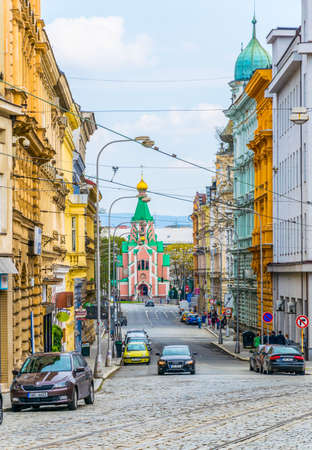OLOMOUC, CZECH REPUBLIC, APRIL 16, 2016: View of a street in the center of the czech city Olomouc with church of saint Gozard at the end.のeditorial素材