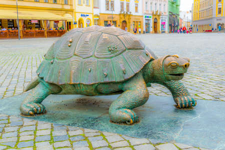 OLOMOUC, CZECH REPUBLIC, APRIL 16, 2016: View of a turtle statue next to the arion fountain in the czech city Olomouc.のeditorial素材