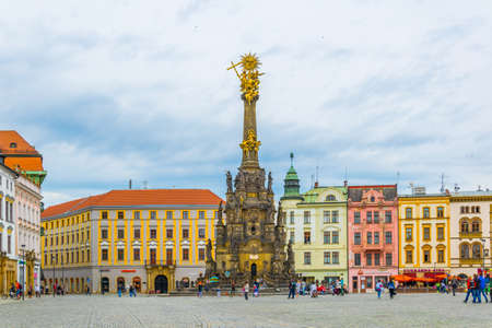 OLOMOUC, CZECH REPUBLIC, APRIL 16, 2016: View of the upper square in the czech city olomouc dominated by the holy trinity column enlisted in the unseco world heritage list.のeditorial素材