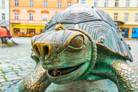 OLOMOUC, CZECH REPUBLIC, APRIL 16, 2016: View of a turtle statue next to the arion fountain in the czech city Olomouc.のeditorial素材