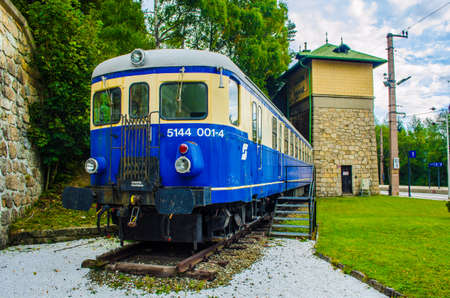 SEMMERING, AUSTRIA, OCTOBER 3, 2015: View of a blue locomotive in front of the main train station in semmering which is a symbol of this unesco world heritage site.のeditorial素材