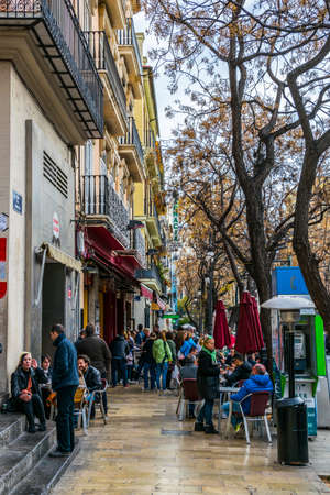 VALENCIA, SPAIN, DECEMBER 30, 2015: View of traffic on a street in front of the central market in spanish city valenciaのeditorial素材