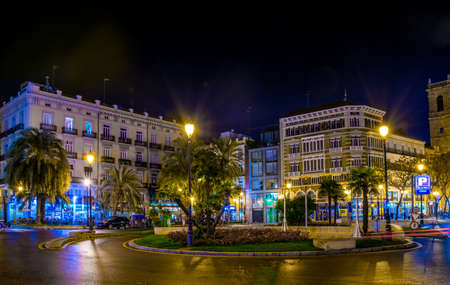 VALENCIA, SPAIN, DECEMBER 30, 2015: View of the plaza de la reina square in valencia during night in winter.のeditorial素材