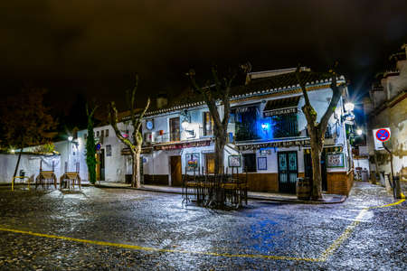 GRANADA, SPAIN, JANUARY 3, 2016: night view of a closed bar near to a lookout spot for the alhambra palace in granada.のeditorial素材