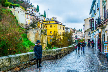 GRANADA, SPAIN, JANUARY 3, 2016: View along the Carrera del Darro in the Albaicin quarter, Granadaのeditorial素材