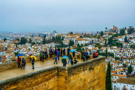 GRANADA, SPAIN, JANUARY 3, 2016: People are enjoying view over Granada from Alhambra palace in spain.のeditorial素材