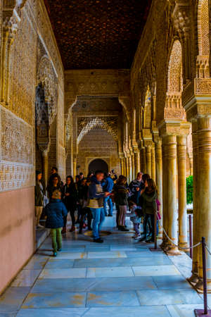 GRANADA, SPAIN, JANUARY 3, 2016: people are enjoying view of the court of lions inside of the alhambra palace in spanish city granadaのeditorial素材