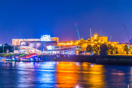 HAMBURG, GERMANY, AUGUST 29, 2016: Night view of the lion king musical building in Hamburg, Germany.のeditorial素材