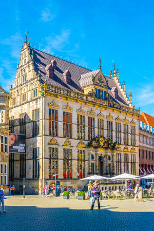 BREMEN, GERMANY, AUGUST 30, 2016: People are walking on the Market square in front of the Schutting (Guild house) in Bremen, Germany.のeditorial素材
