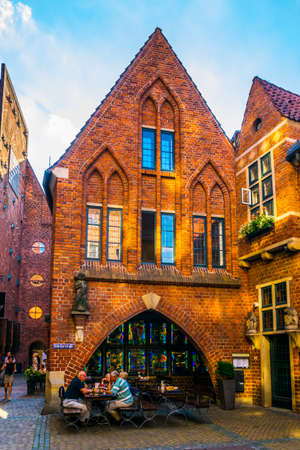 BREMEN, GERMANY, AUGUST 30, 2016: People are strolling through the Boettcherstrasse street in Bremen, Germany.のeditorial素材