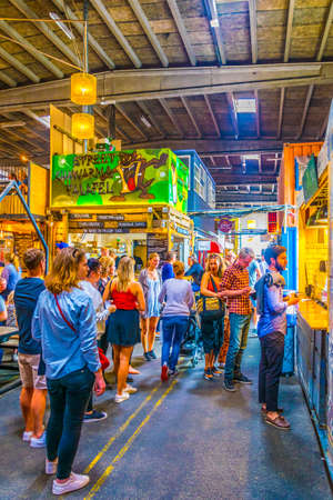 COPENHAGEN, DENMARK, AUGUST 20, 2016: People are strolling through Papiroen street food market, Denmark.のeditorial素材