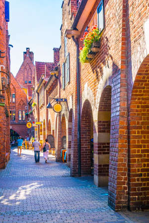 BREMEN, GERMANY, AUGUST 30, 2016: People are strolling through the Boettcherstrasse street in Bremen, Germany.のeditorial素材