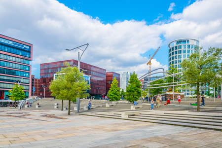 HAMBURG, GERMANY, AUGUST 29, 2016: People are strolling thorugh the hafencity district in Hamburg, Germany.のeditorial素材