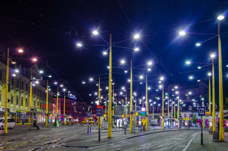 GRAZ, AUSTRIA, JULY 30, 2015: night view of a public transportation hub on jakominiplatz in the austrian city grazのeditorial素材