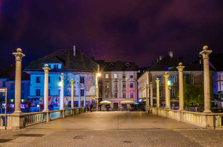 LJUBLJANA, SLOVENIA, JULY 29, 2015: night view of one of many bridges over ljubljanica river in the slovenian capital ljubljanaのeditorial素材