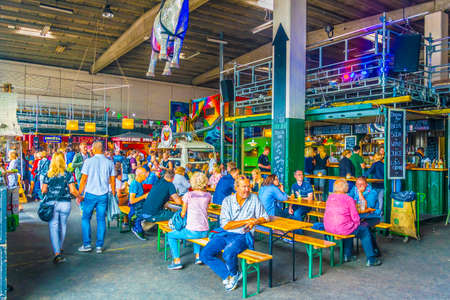 COPENHAGEN, DENMARK, AUGUST 20, 2016: People are strolling through Papiroen street food market, Denmark.のeditorial素材