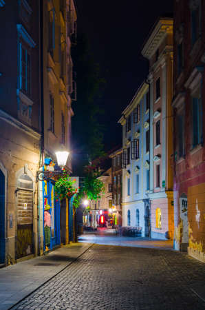 LJUBLJANA, SLOVENIA. JULY 29, 2015: Night view of the ciril-metodov trg square in the medieval center of Ljubljanaのeditorial素材