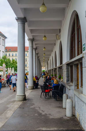 LJUBLJANA, SLOVENIA, JULY 29, 2015: Ljubljana Market arcade on the Ljubljanica riverのeditorial素材
