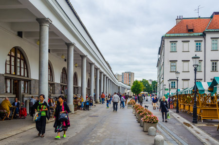 LJUBLJANA, SLOVENIA, JULY 29, 2015: Ljubljana Market arcade on the Ljubljanica riverのeditorial素材