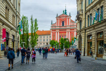 LJUBLJANA, SLOVENIA, JULY 29, 2015: Stritarjeva street is one of the major pedestrian route for tourists near triple bridge and the franciscan church of the annunciationのeditorial素材