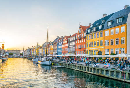 COPENHAGEN, DENMARK, AUGUST 21, 2016: Sunset view of old Nyhavn port in the central Copenhagen, Denmark.のeditorial素材